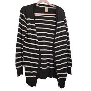 Black and white striped cardigan with button closure